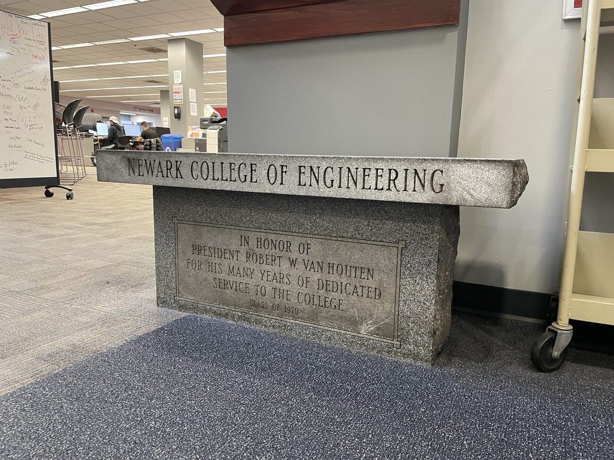 Newark College of Engineering dedication stone honoring President Robert W. Van Houten, inside the library